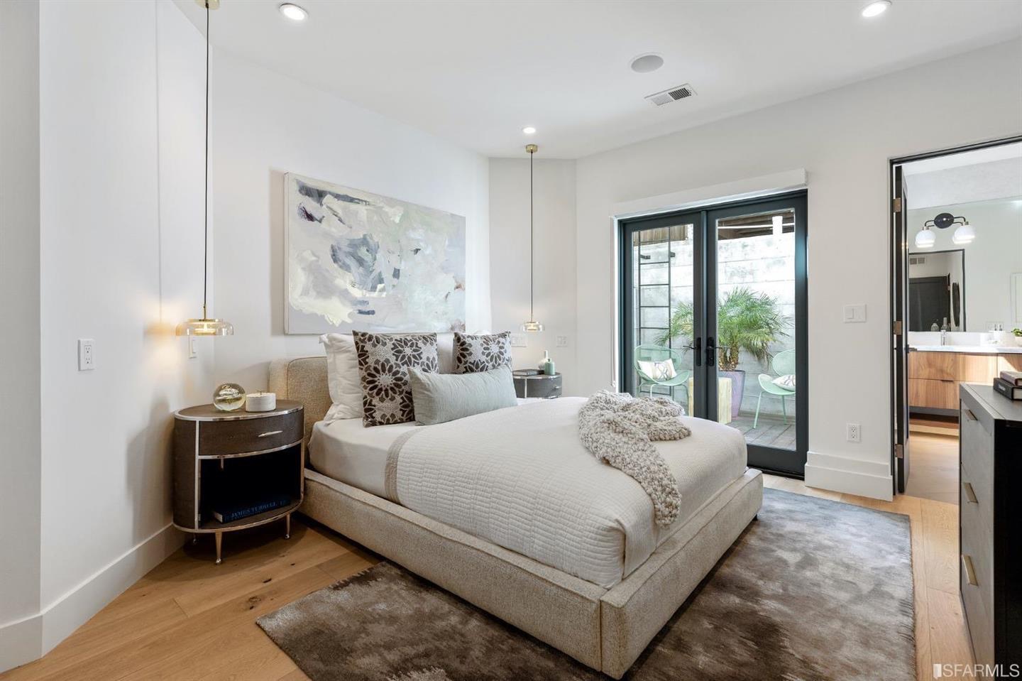 Bedroom with layered lighting