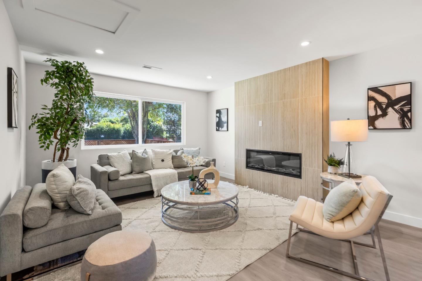 Living room with porcelain fireplace wall